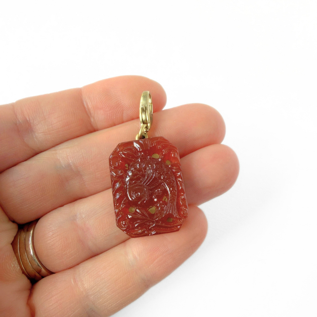 Vintage Pierced Carnelian Glass Octagonal Fish Charm